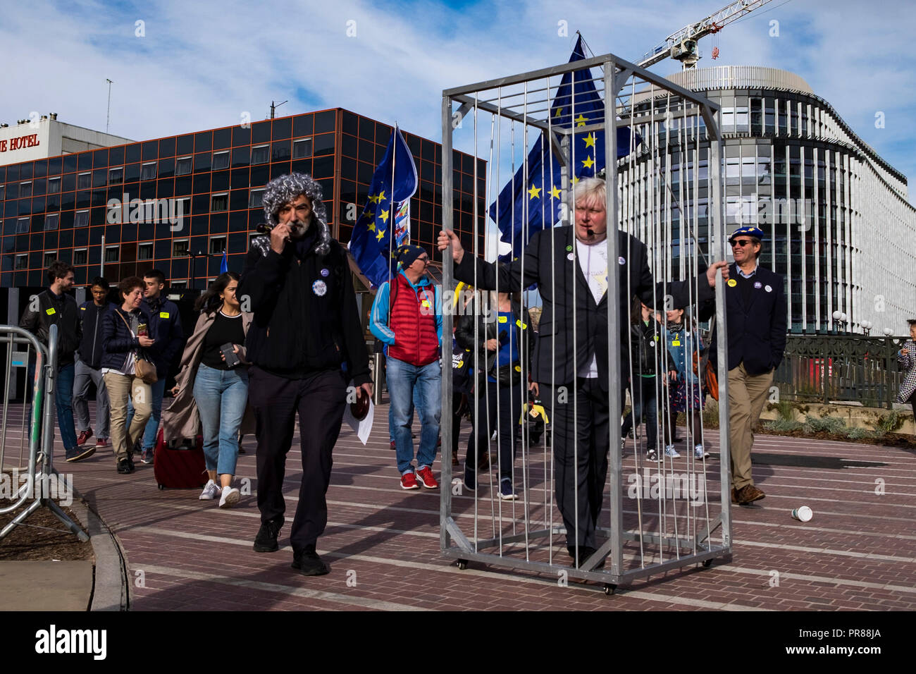 Birmingham, UK 30th September 2018. A jailed 'Boris Johnson' is paraded through the streets of Birmingham during an anti Brexit protest, locked up for crimes against human decency (C) Paul Swinney/Alamy Live News Stock Photo