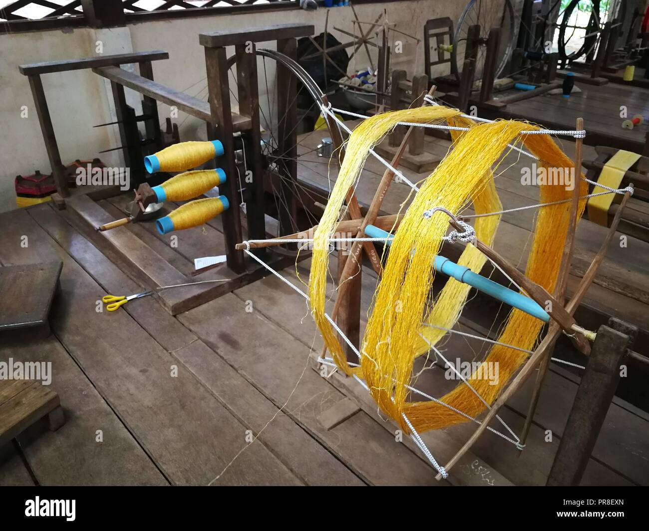 Silk weaving process in Cambodia. Hand work. Handicrafts