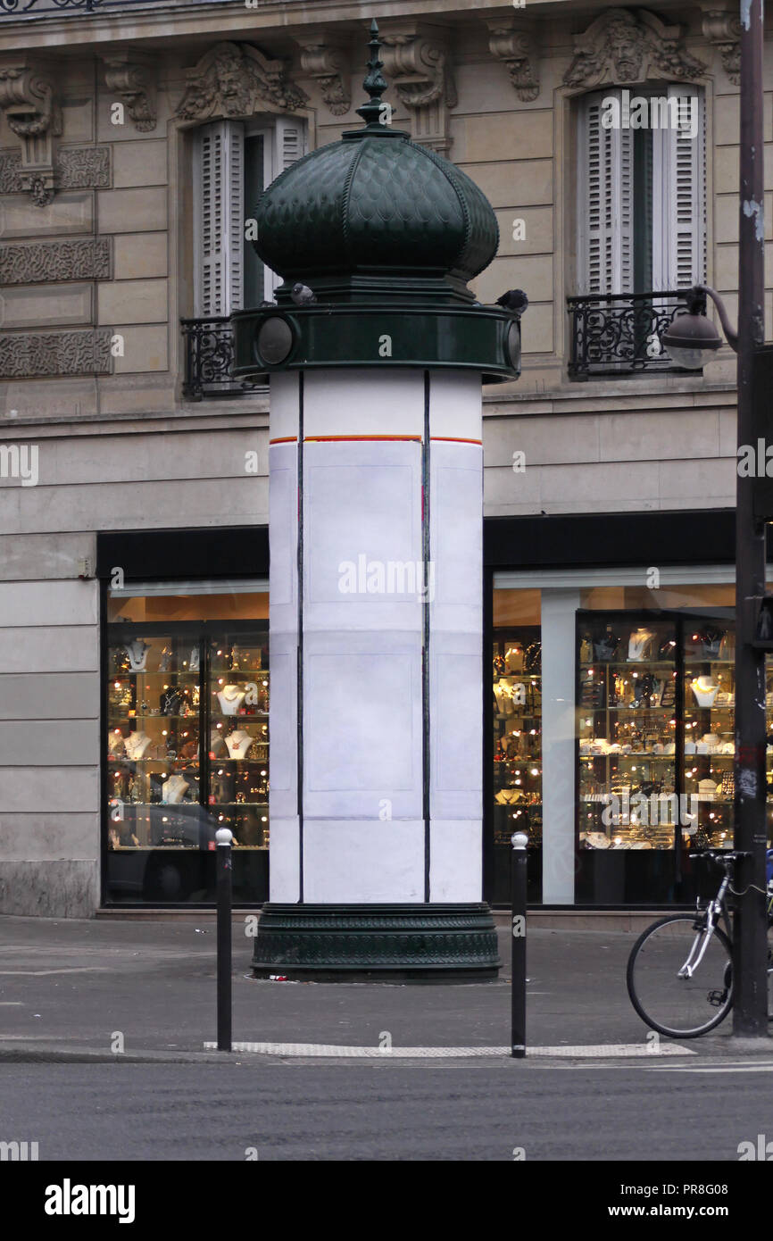 Classic style advertising kiosk column in Paris Stock Photo