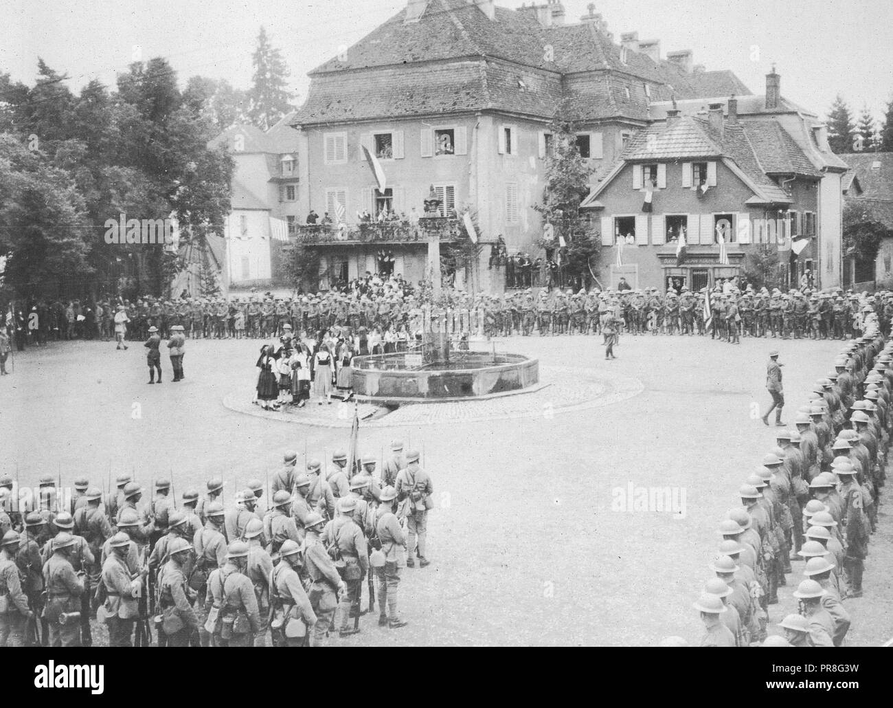American Independence Day in Alsace. A scene on Independence Day in the Place de Yasseraux. American and French troo[s surround the square at which a patriotic service was held Stock Photo