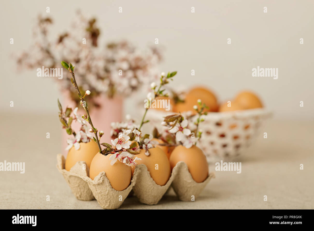 Happy easter. Easter decoration - flowering branches in the shell from the eggs. Selective focus. Stock Photo