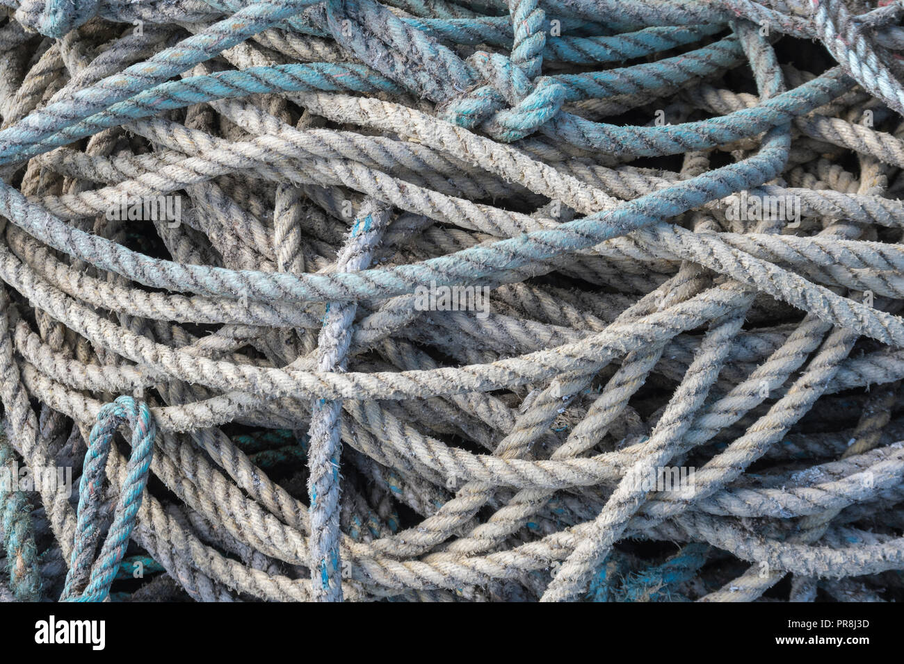 Tangled Marine Ropes Harbour scenes around Newquay, Cornwall. Coiled commercial marine rope ...