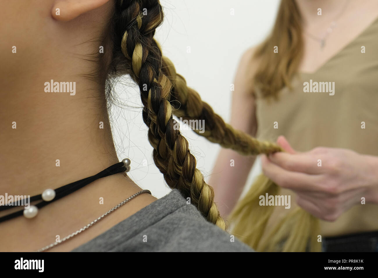 Market braiding hair hi-res stock photography and images - Alamy