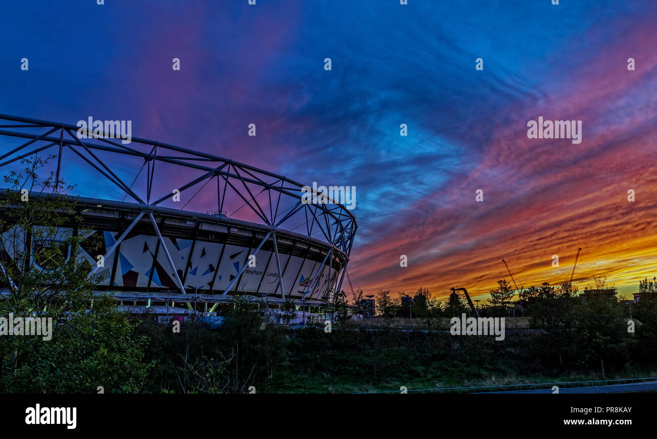 Sunset over the Olympic Stadium in the Queen Elizabeth Park in London. The Stadium is now home to West Ham F.C. Stock Photo