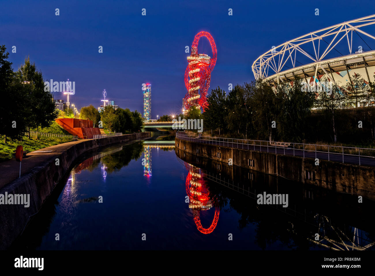The Olympic Stadium, and Orbit in the Queen Elizabeth Park in London at Night Stock Photo