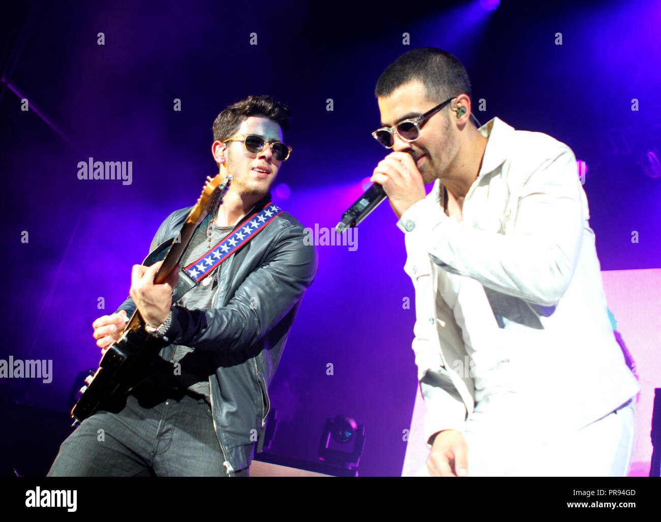 Nick Jonas (L) and Joe Jonas with The Jonas Brothers perform at the