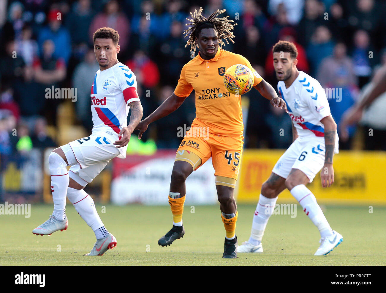 Livingston's Dolly Menga (centre) vies with Rangers' James Tavernier (left) and Connor Goldson during the Ladbrokes Scottish Premiership match at the Tony Macaroni Arena, Livingston. Stock Photo