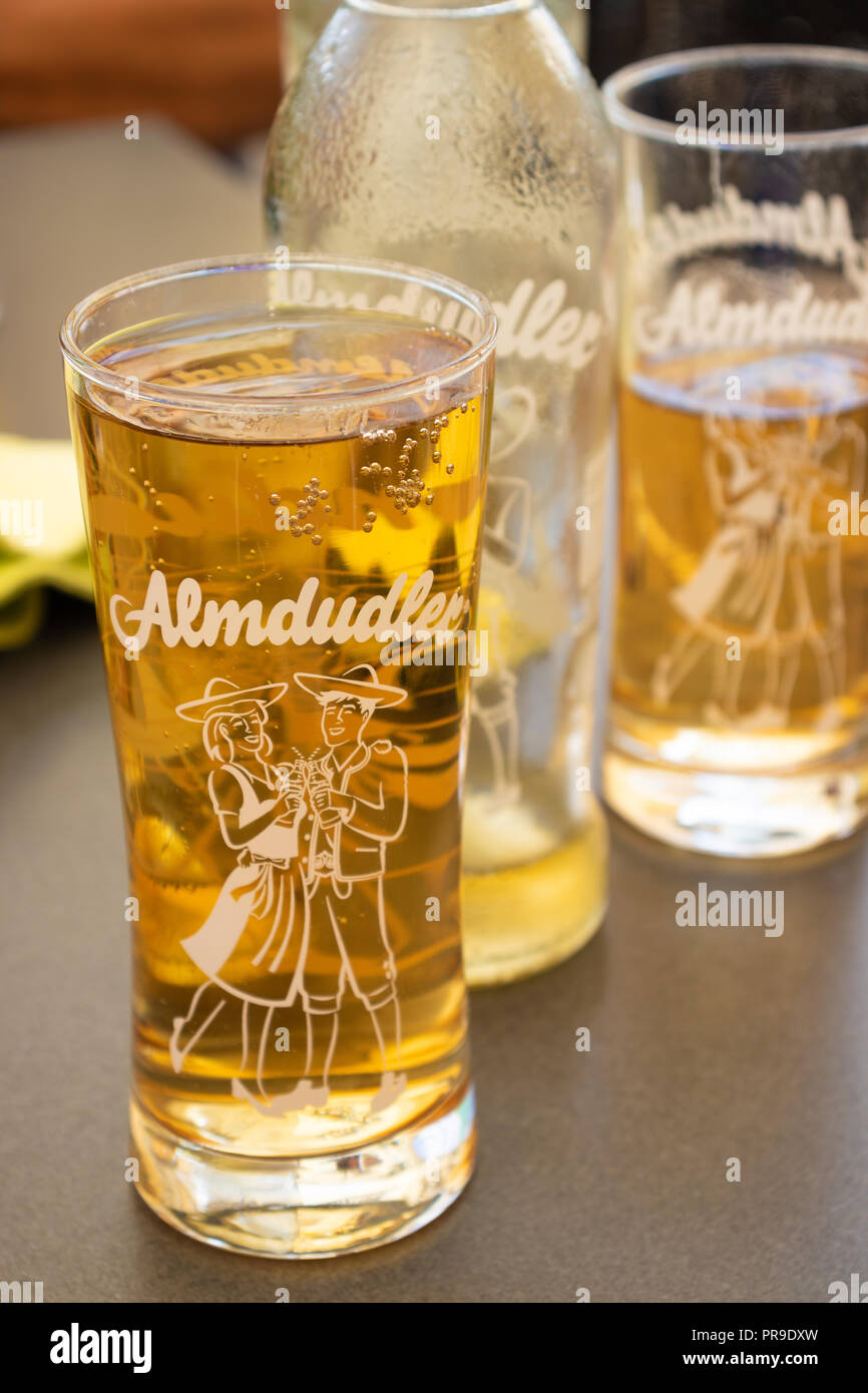 Glasses of Almdudler a popular drink from Austria. Almdudler has been called the 'national drink of Austria'. Stock Photo