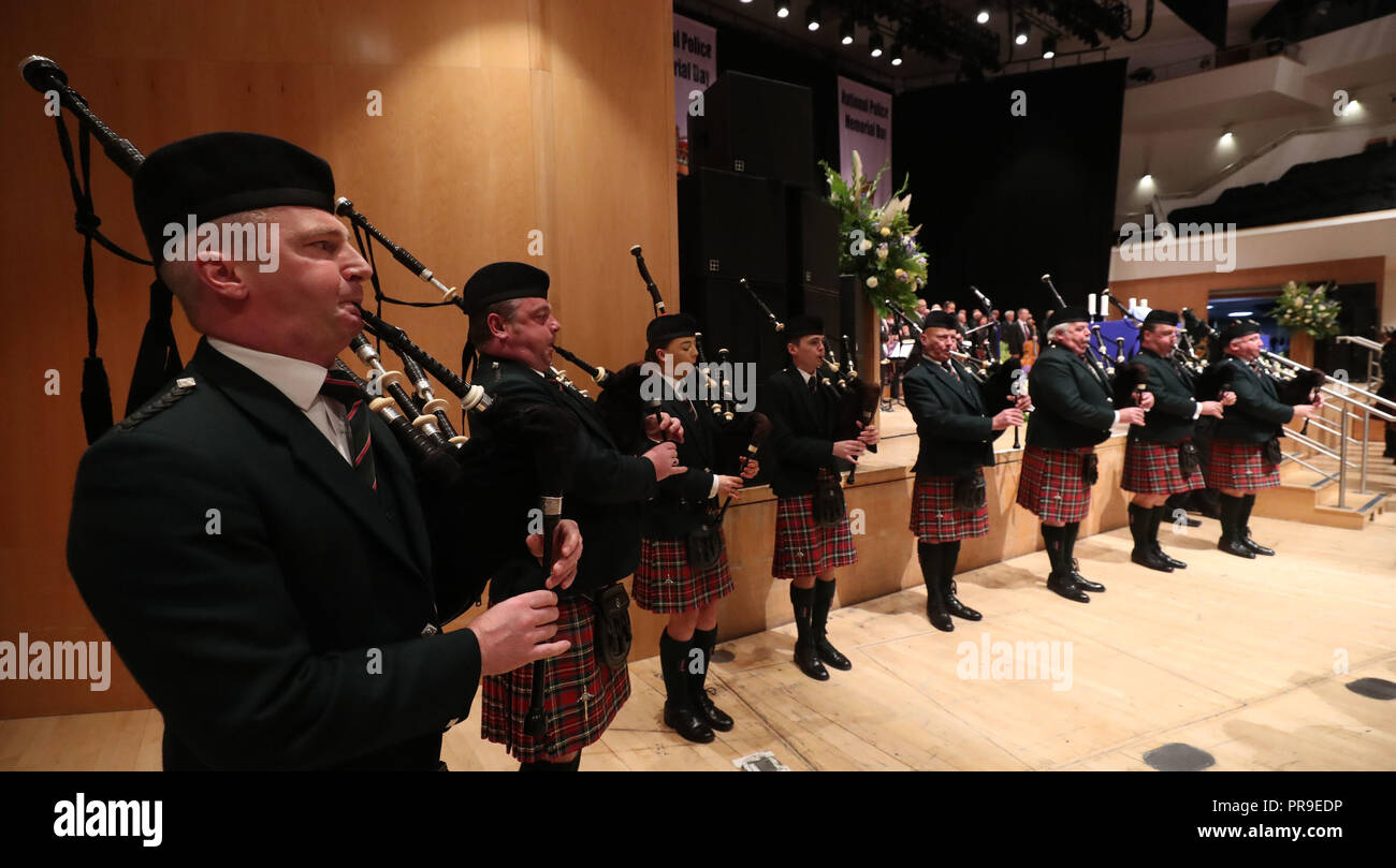 Pipers from the PSNI band during the service at at the Waterfront Hall