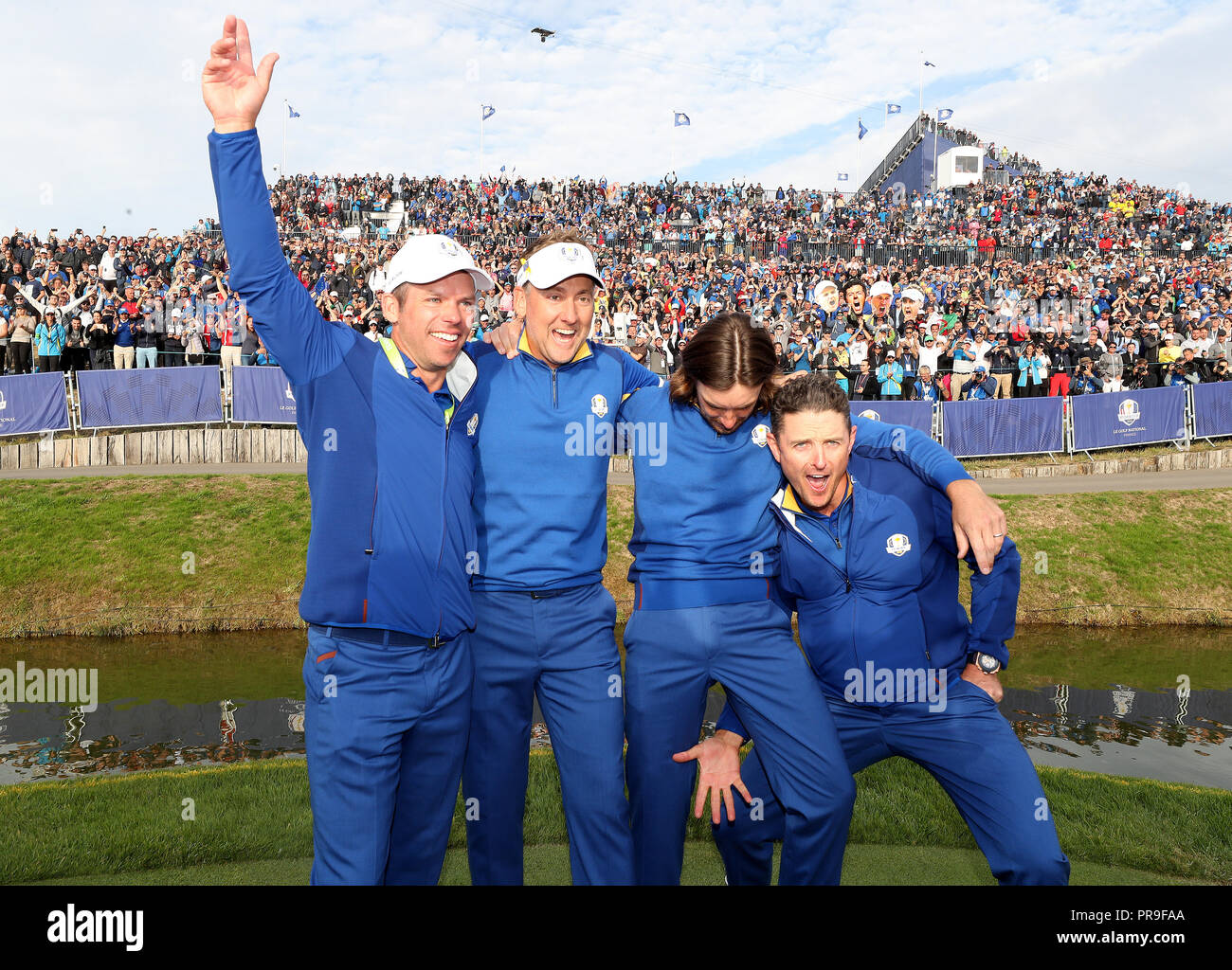Team Europe's (left-right) Paul Casey, Ian Poulter, Tommy Fleetwood and Justin Rose celebrate after the Singles match on day three of the Ryder Cup at Le Golf National, Saint-Quentin-en-Yvelines, Paris. Stock Photo