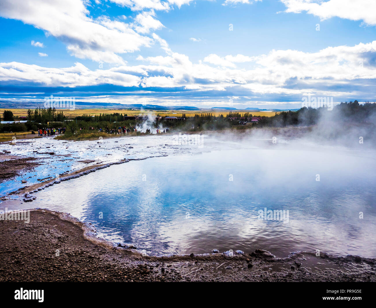 Steaming geothermal pool at Geyser at the Golden Circle Iceland Stock Photo
