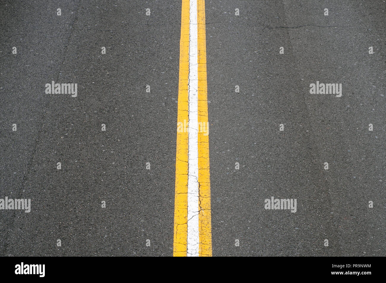 white line on asphalt road - two lane street Stock Photo