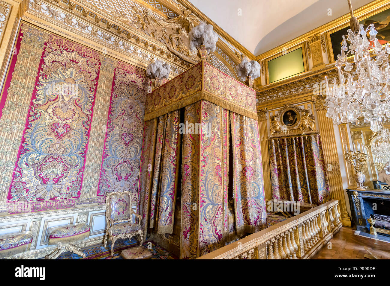 Versailles, France - March 14, 2018: Versailles Royal Apartment - The King's room with the King's Bedroom, created in 1701 where lived Louis XIV until Stock Photo