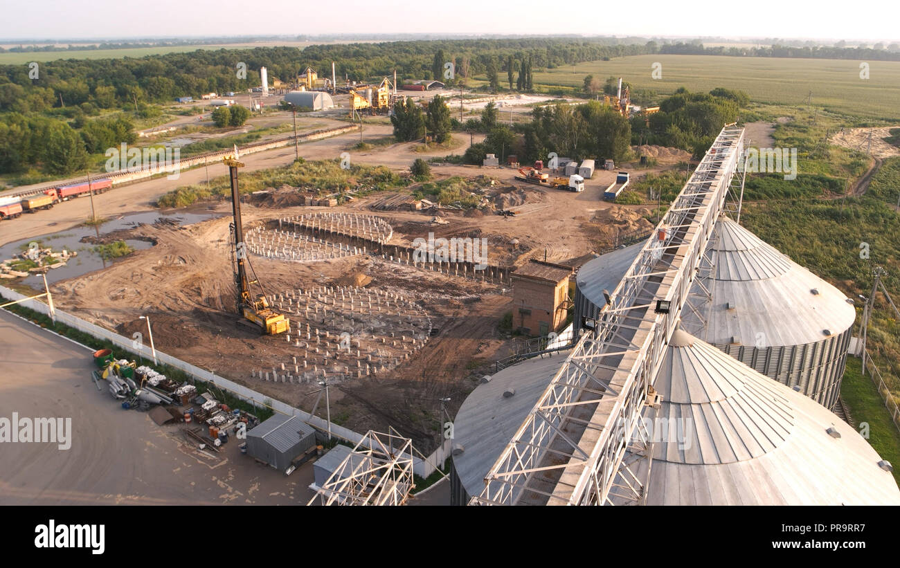 Construction of grain factory at rural location. Stock Photo