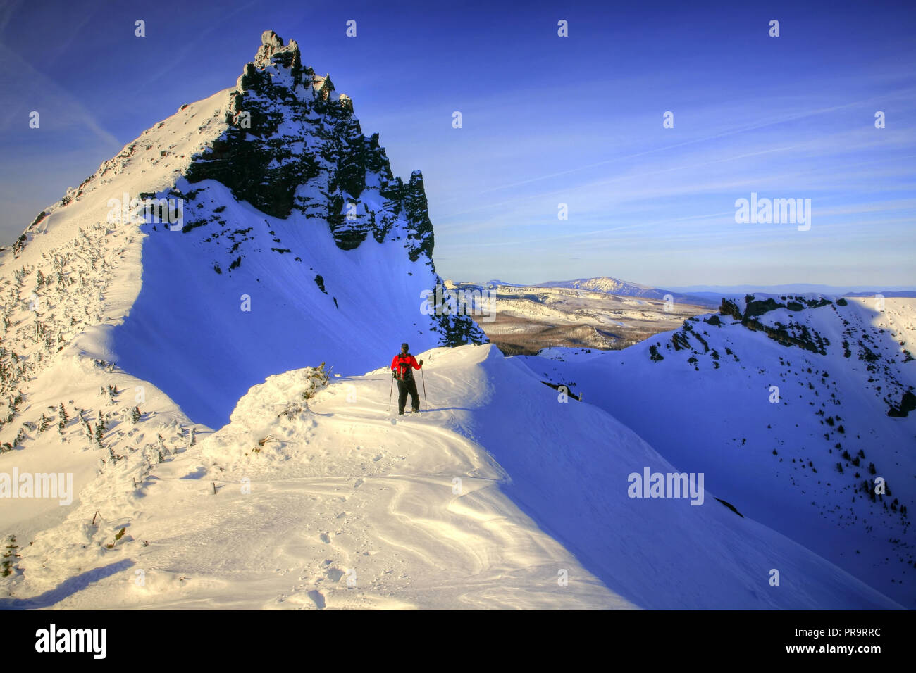 Mountain Climber High on the Slopes of Three Fingered Jack Near Sisters Oregon Stock Photo