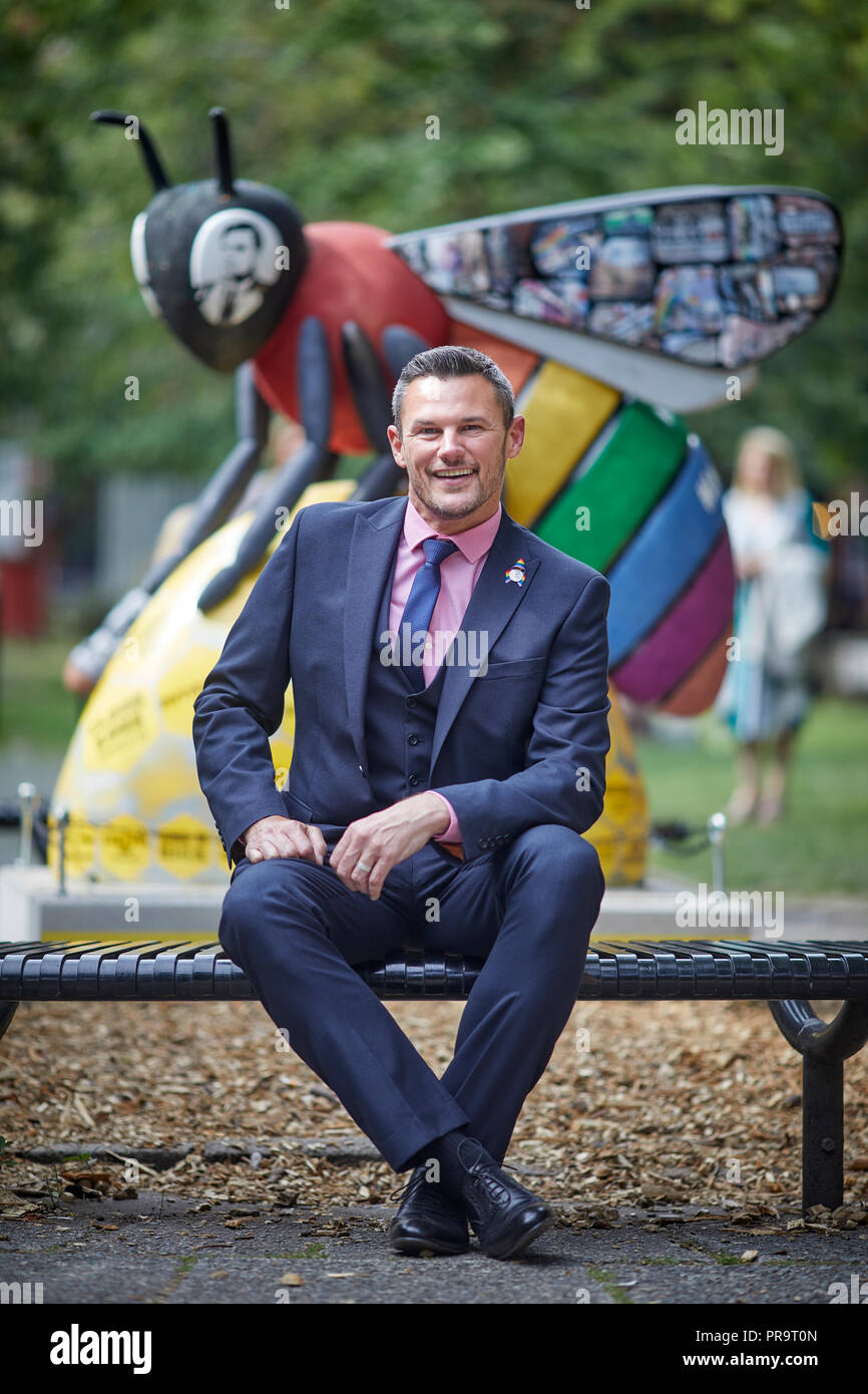 Carl Austin-Behan LGBT adviser to Andy Burnham Mayor of Manchester in  Sackville Gardens in Manchester's gay village, Stock Photo