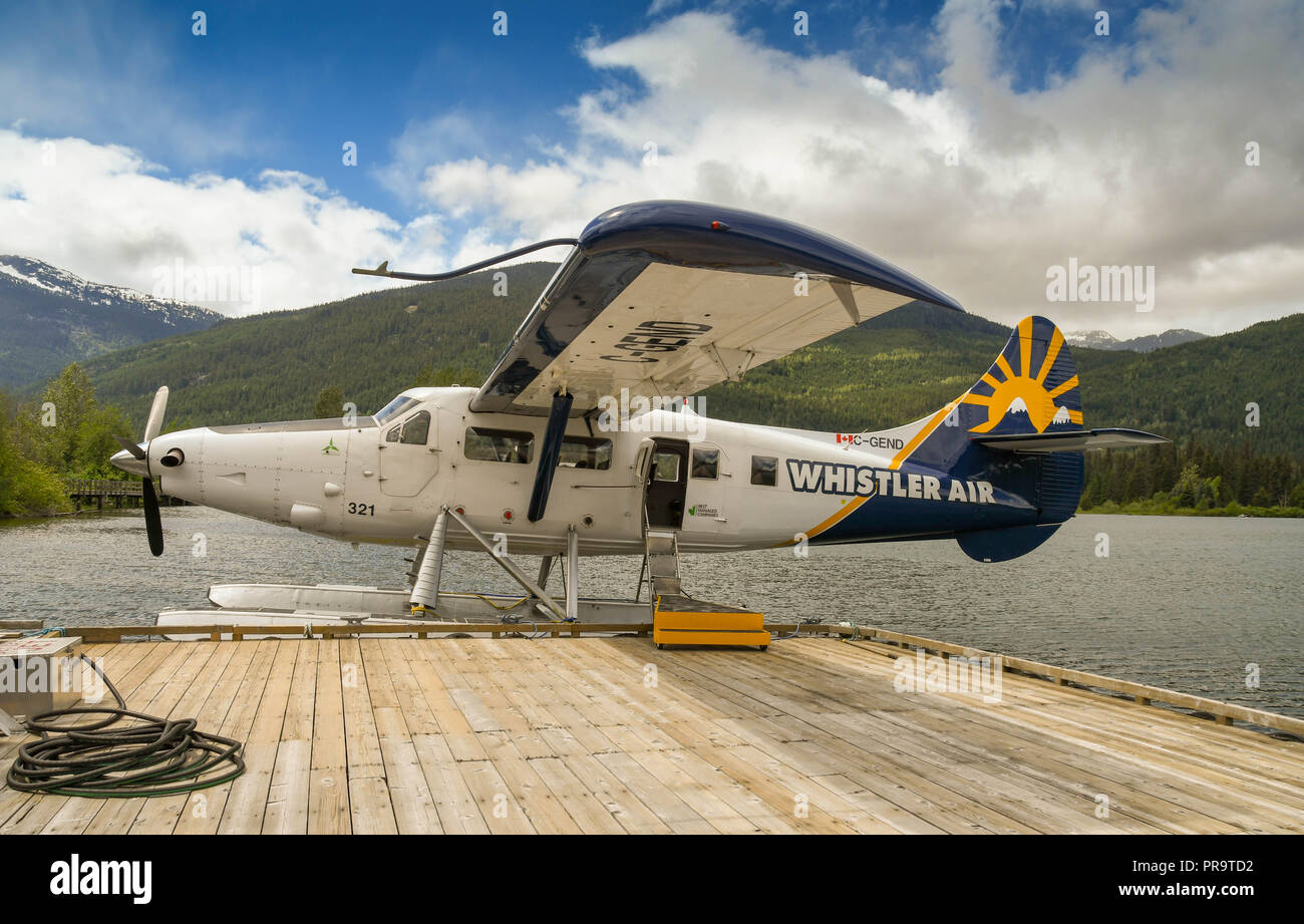WHISTLER, BC, CANADA - JUNE 2018: Whistler Air De Havilland Turbine Otter aircraft tied up at the jetty of the seaplane terminal in Whistler. Stock Photo