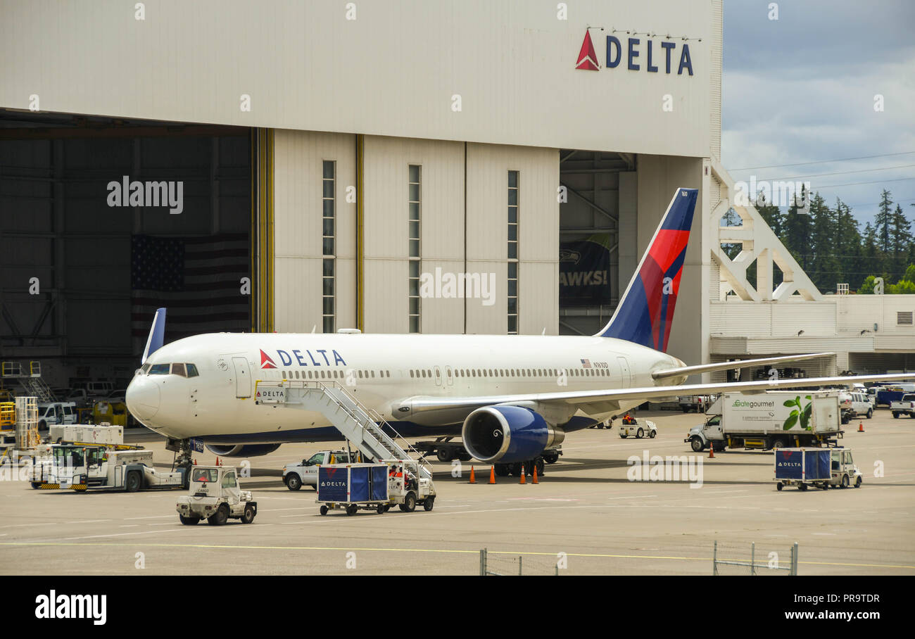 SEATTLE TACOMA AIRPORT, WA, USA - JUNE 2018: Delta Airlines Boeing 767 jet parked outside a maintenance hangar at Seattle Tacoma airport. Stock Photo