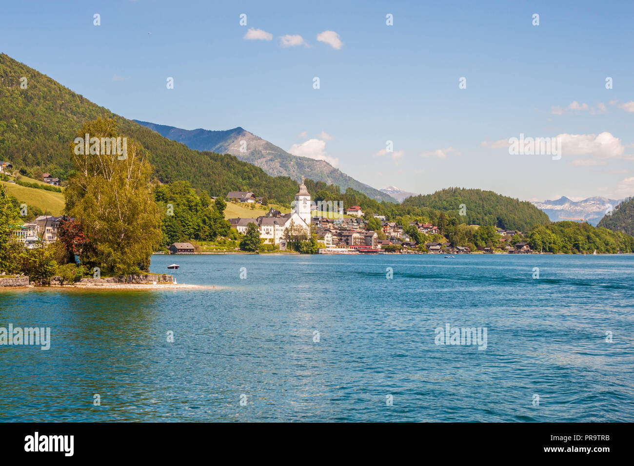 St. Wolfgang chapel and the beautiful town of St. Wolfgang at alpine Wolfgangsee lake, Austria