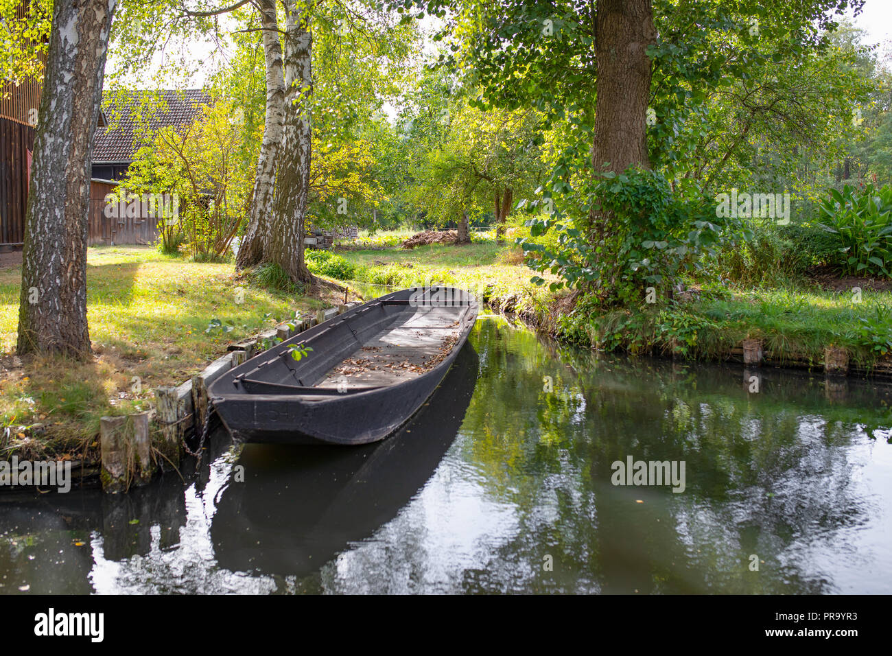 Lehde, Spreewald / Germany.  Typical Spreewald landscape. Canals, vivid plants and wooden architecture. Stock Photo