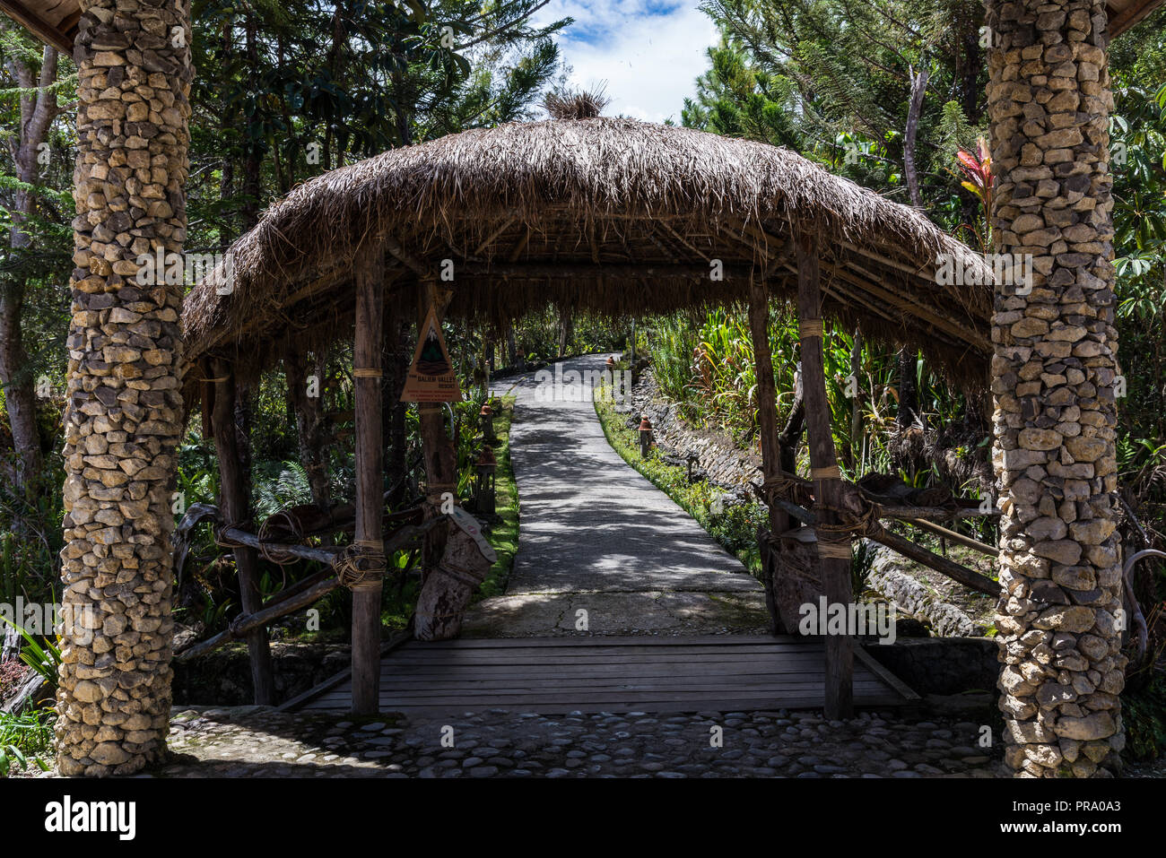 Entrance to the main lodge of the Baliem Valley Resort. Wamena, Papua, Indonesia. Stock Photo
