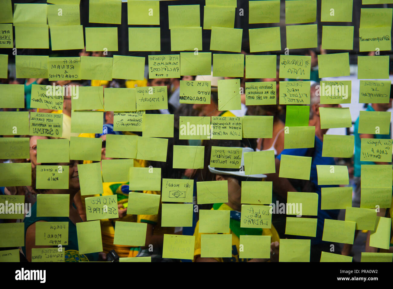 Business wallpaper background of yellow post-it sticky notes on a glass  wall Stock Photo - Alamy