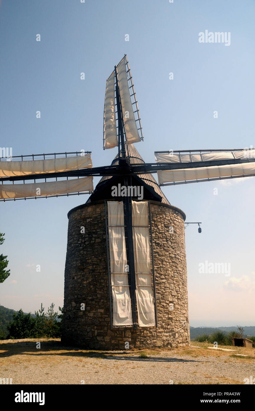 The windmill of St. Elzear de Montfuron on a hill outside the village of the same name the Alpes de Haute Provence in the south of France. Stock Photo