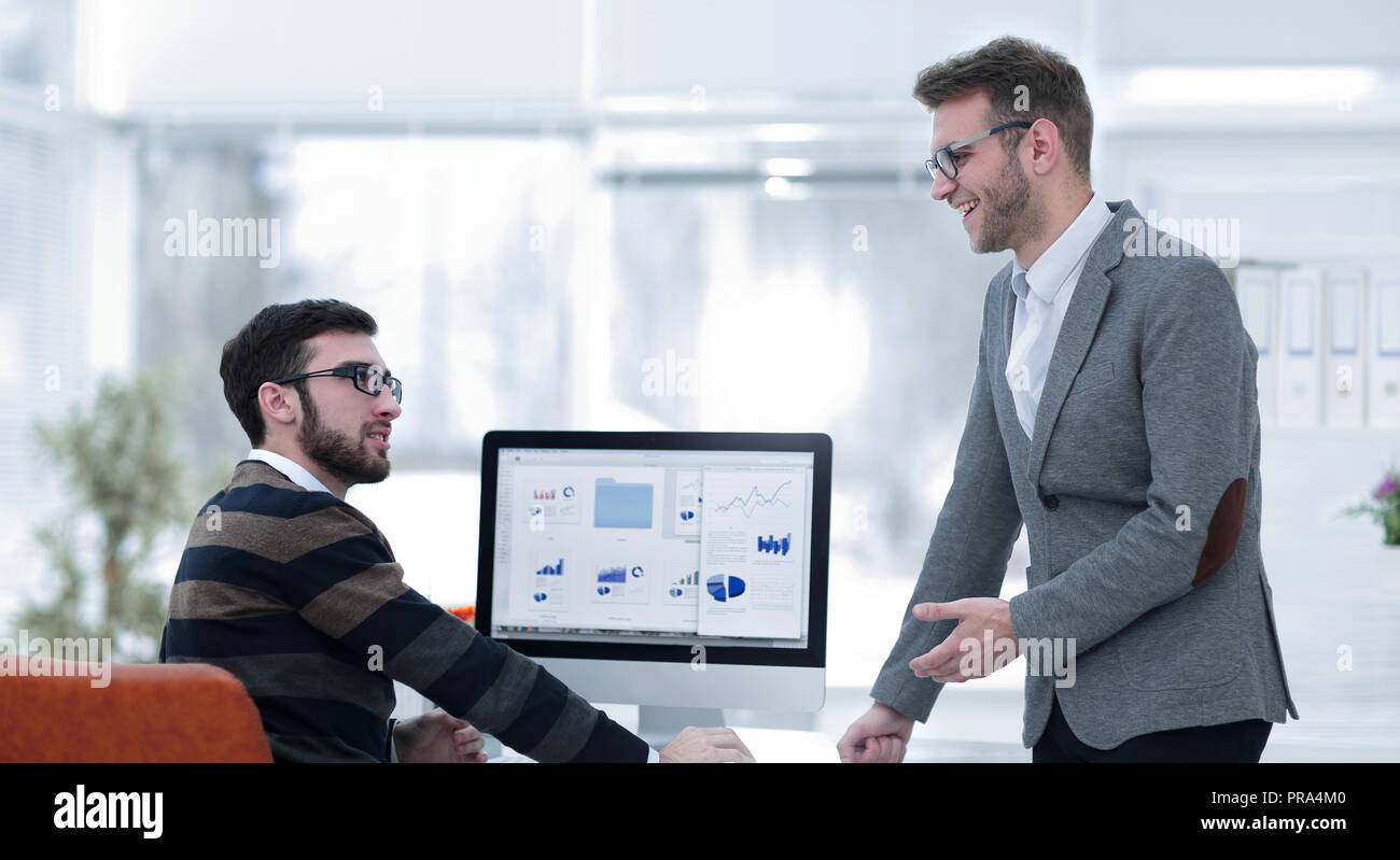 two businessmen analyzing stats financial data Stock Photo