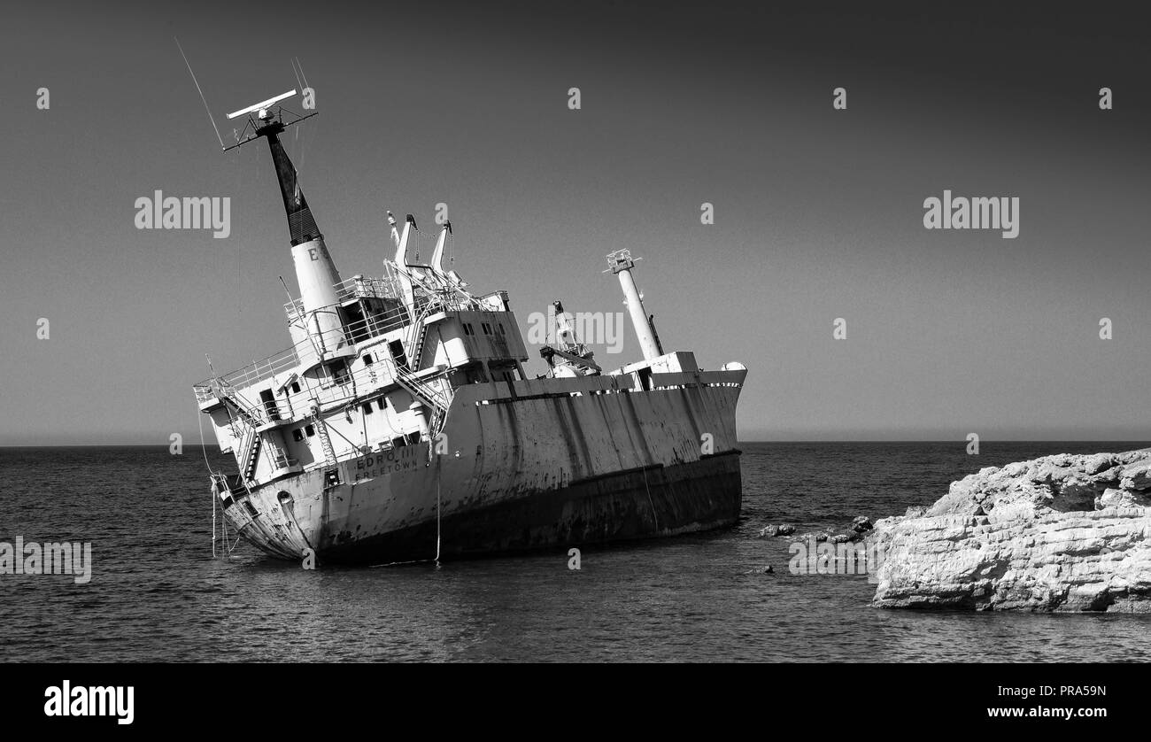 cargo vessel washed up on the rocks Stock Photo