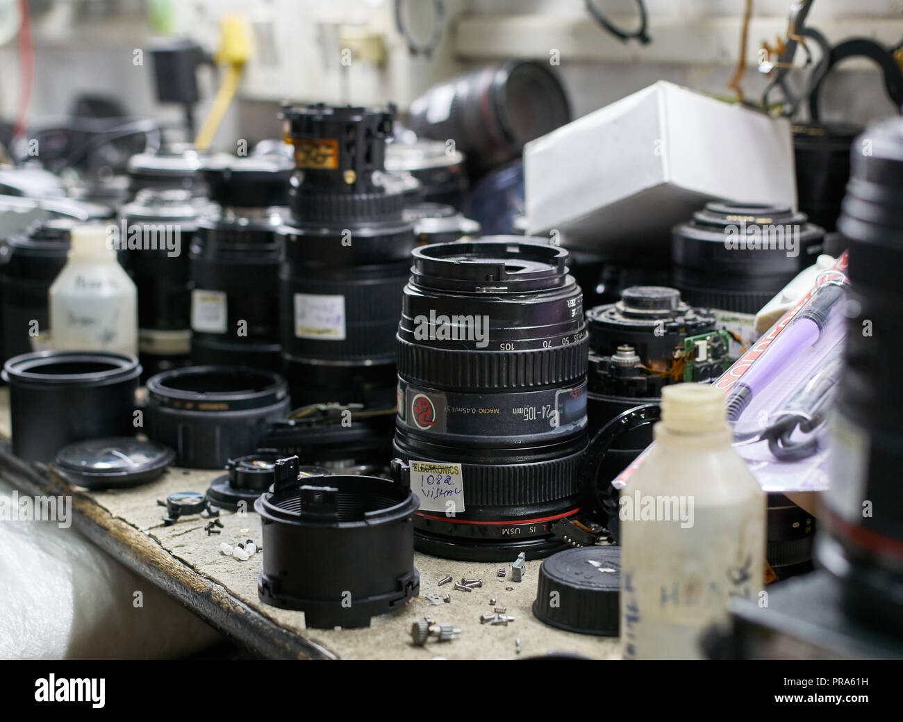 Camera lenses in a repair shop Stock Photo