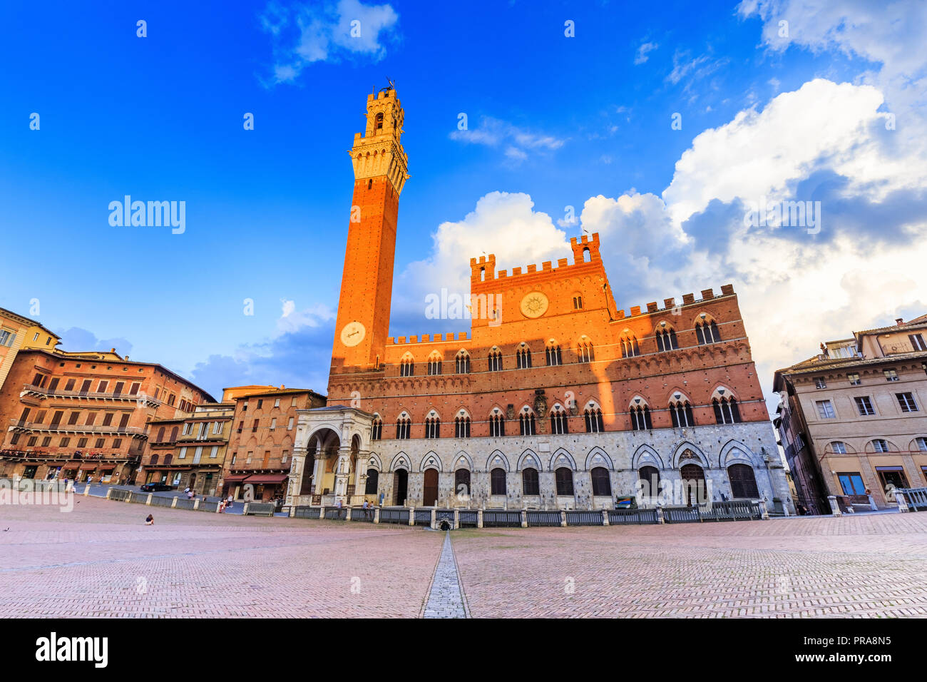 Siena, Italy. Palazzo Publico and Piazza del Campo at sunset. Stock Photo