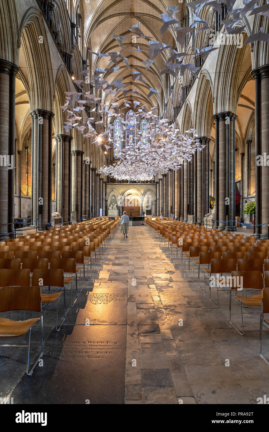 Main aisle of Salisbury Cathedral with paper doves art installation Stock Photo