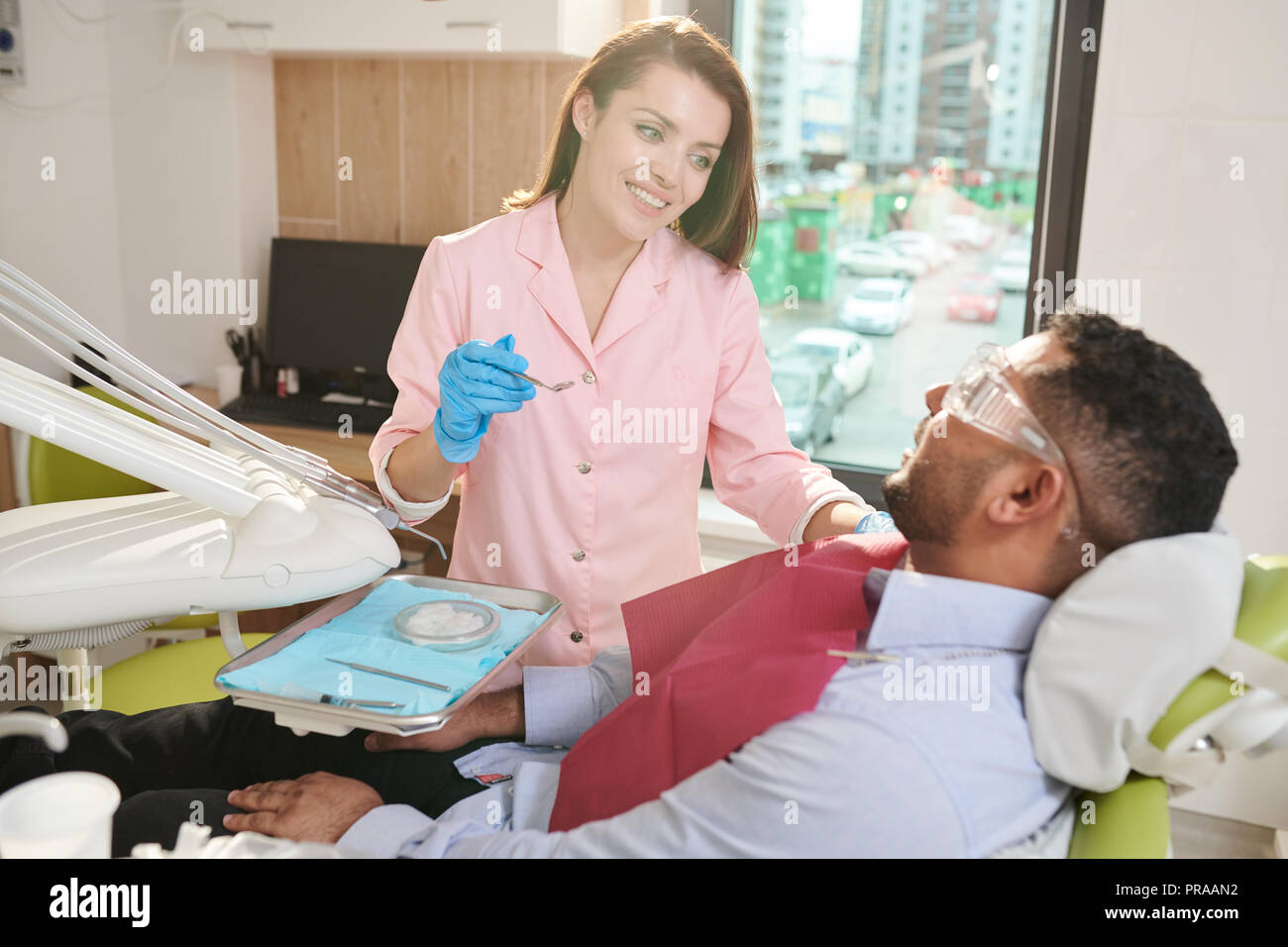 Female Dentist Working Stock Photo