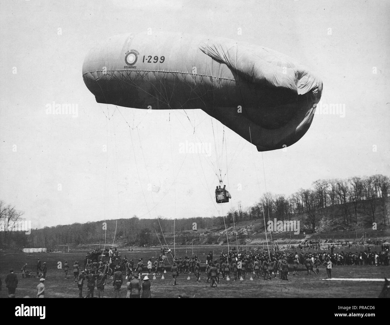 Observation balloon at Van Courtland Park. Scenes of battle were enacted at Van Courtland Park to aid Victory Loan. Shows one of big observation balloons directing the artillery fire on the ground. Real shells were exploded Stock Photo