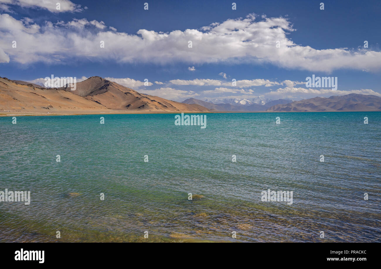 Images of remote Karakul Lake, a brackish high elevation lake, on the eastern section of the Pamir Highway in eastern Tajikistan. Stock Photo