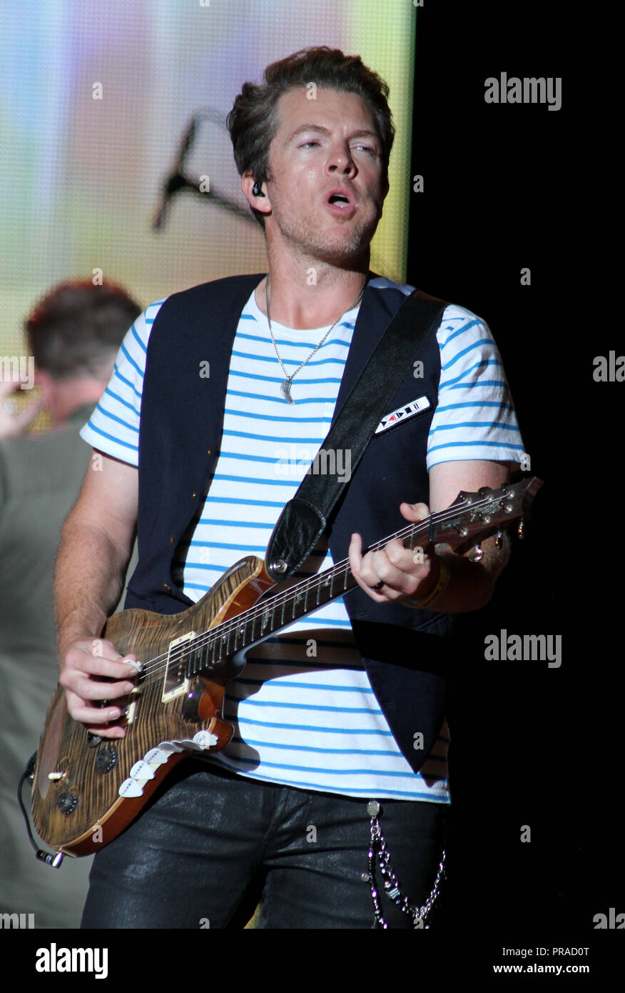 Joe Don Rooney with Rascal Flatts performs in concert at the Cruzan Amphitheatre in West Palm Beach, Florida on September 13, 2014 Stock Photo
