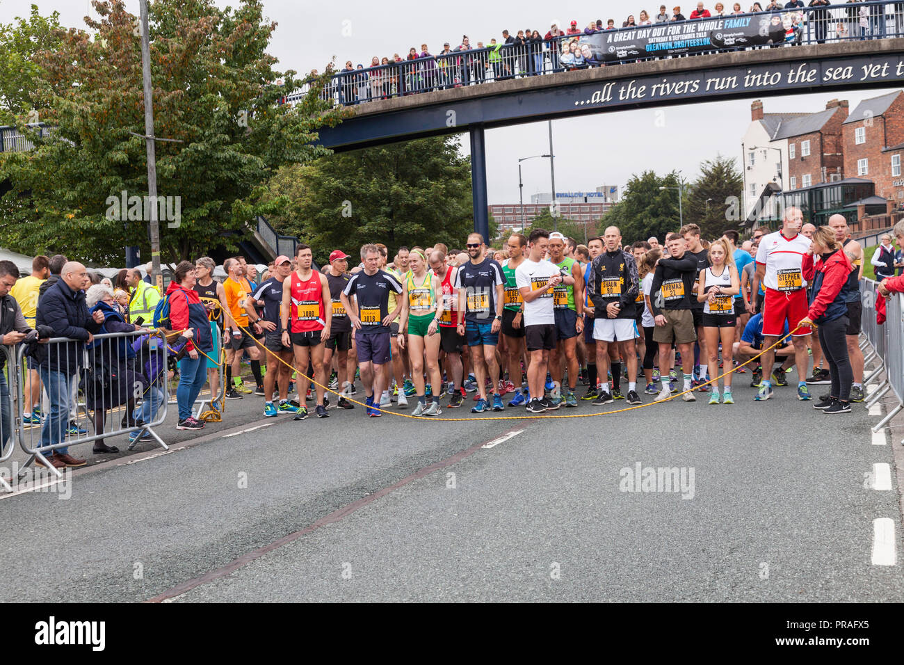 The runners in the Simplyhealth Great Tees 10 K race wait nervously for the start at the Riverside Road,Stockton on Tees,England,UK Stock Photo
