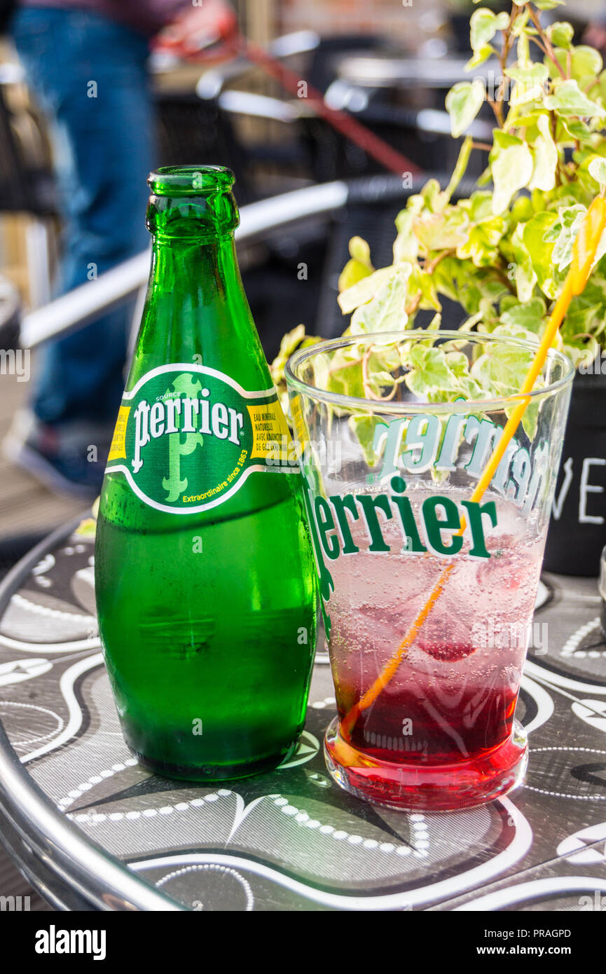 Perrier Sirop, mineral water with raspberry syrup, L'Univers bar, Bergues, Nord Pas de Calais, Hauts de France, France Stock Photo