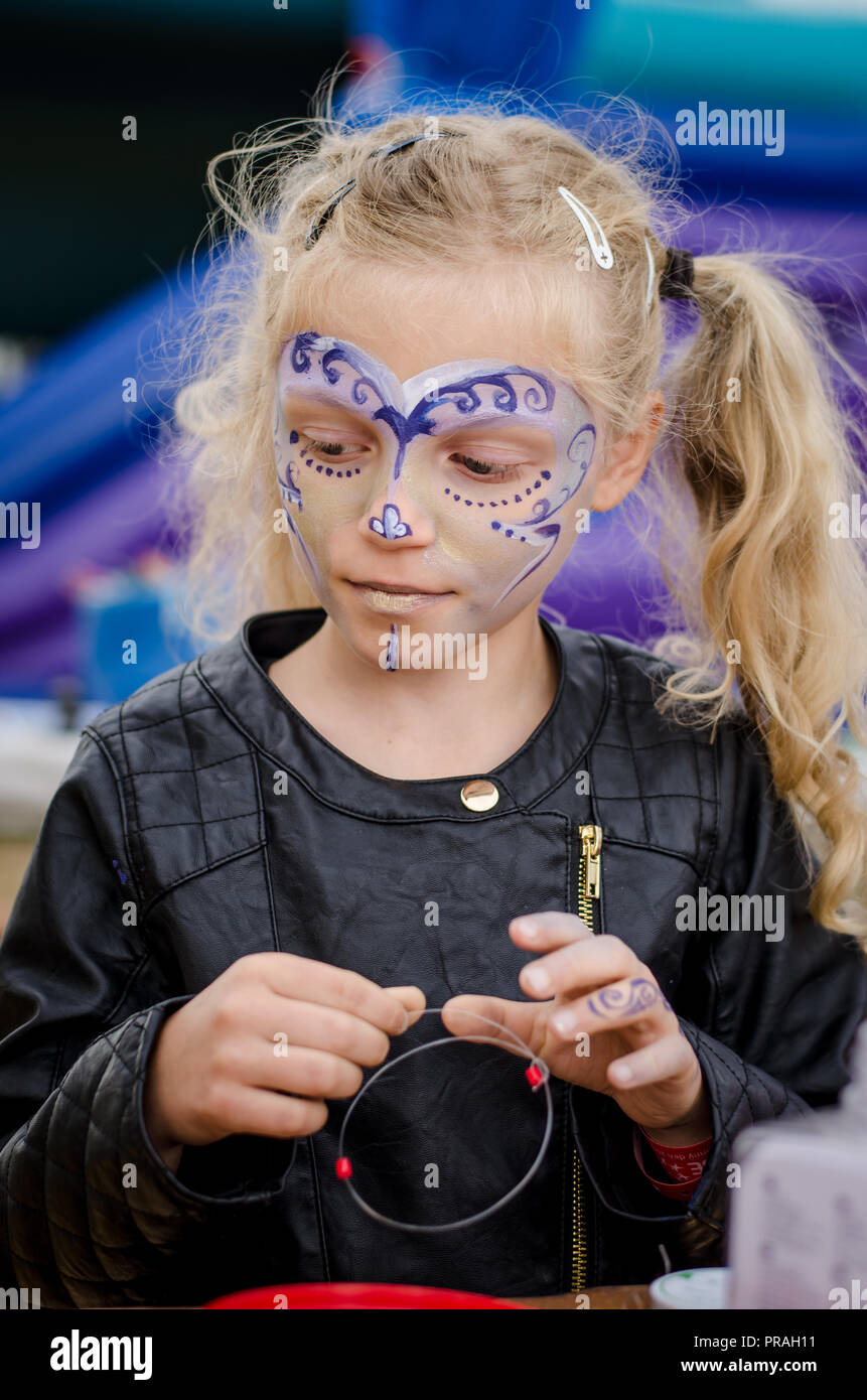 adorable blond girl with face painting portrait Stock Photo Alamy