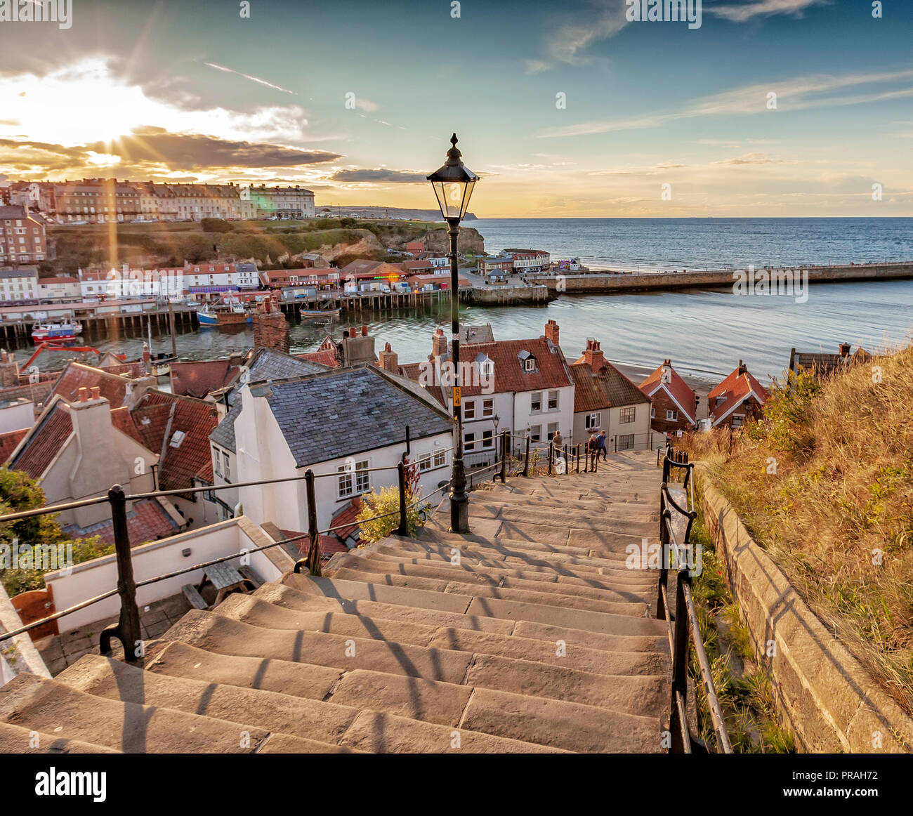 beautiful sunset over 199 steps at Whitby, North Yorkshire coast, England Stock Photo