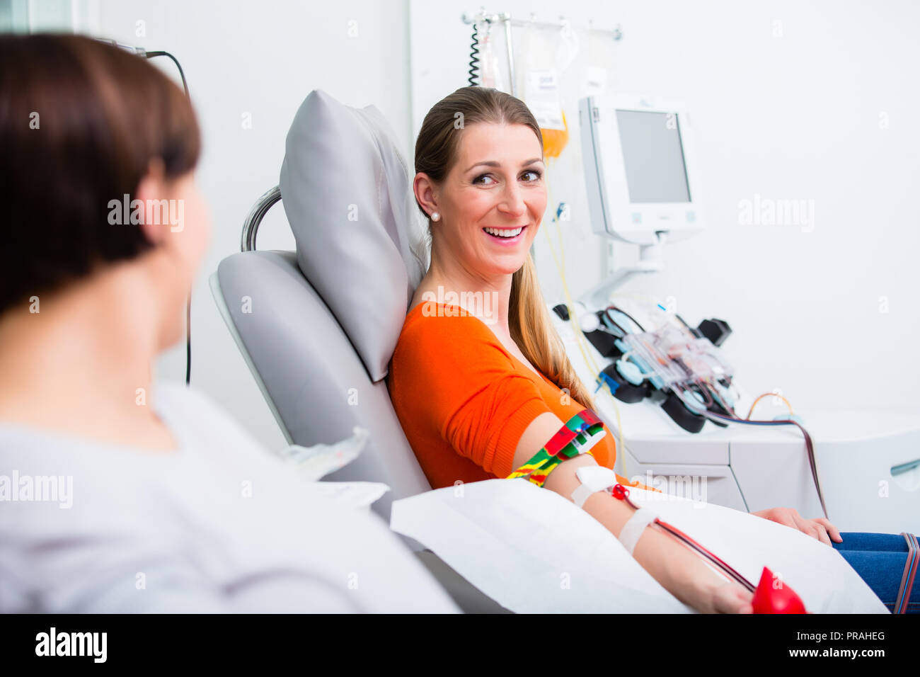 Two women at blood donation drop-in Stock Photo