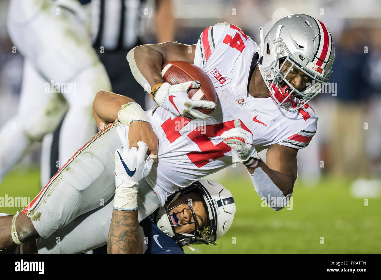 University Park, Pennsylvania, USA. 29th Sep, 2018. Ohio State Buckeyes wide receiver K.J. Hill (14) is tackled after a reception during the second half of the NCAA football game between the Ohio State Buckeyes and the Penn State Nittany Lions at Beaver Stadium in University Park, Pennsylvania. Credit: csm/Alamy Live News Stock Photo