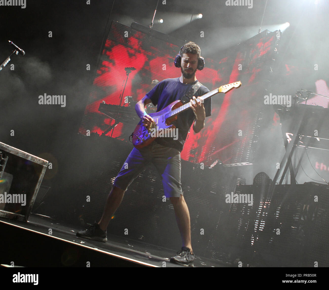 Brad Delson with Linkin Park performs on the opening night of their tour at the Cruzan Amphitheatre in West Palm Beach, Florida on August 8, 2014. Stock Photo