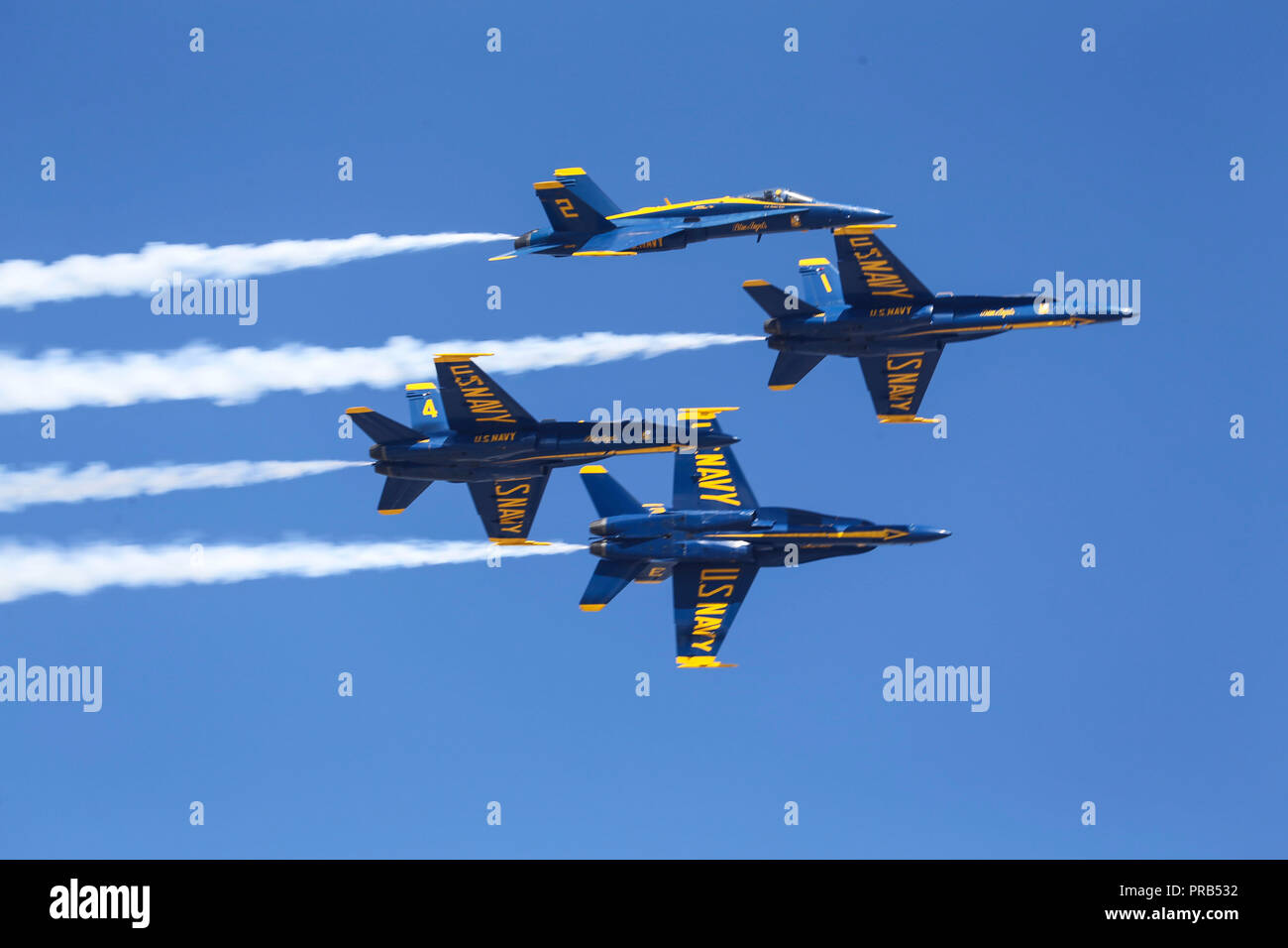 U.S. Navy Blue Angels perform dynamic aerial aerobatics during the 2018 Marine Corps Air Station Miramar Air Show on MCAS Miramar, Calif., Sept. 29. This years air show honors '100 years of women in the Marine Corps' by featuring several performance and displays that highlight accomplishments and milestones women made since the first female enlistee, Opha May Johnson, who joined the service in 1918. (U.S. Marine Corps photo by Raynaldo D. Ramos) Stock Photo