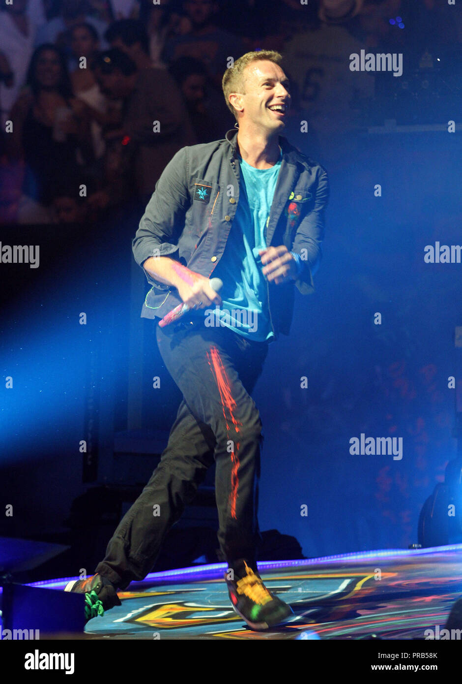 Chris Martin with Coldplay performs in concert on their Mylo Xyloto tour 2012 at the American Airlines Arena in Miami on June 29, 2012. Stock Photo