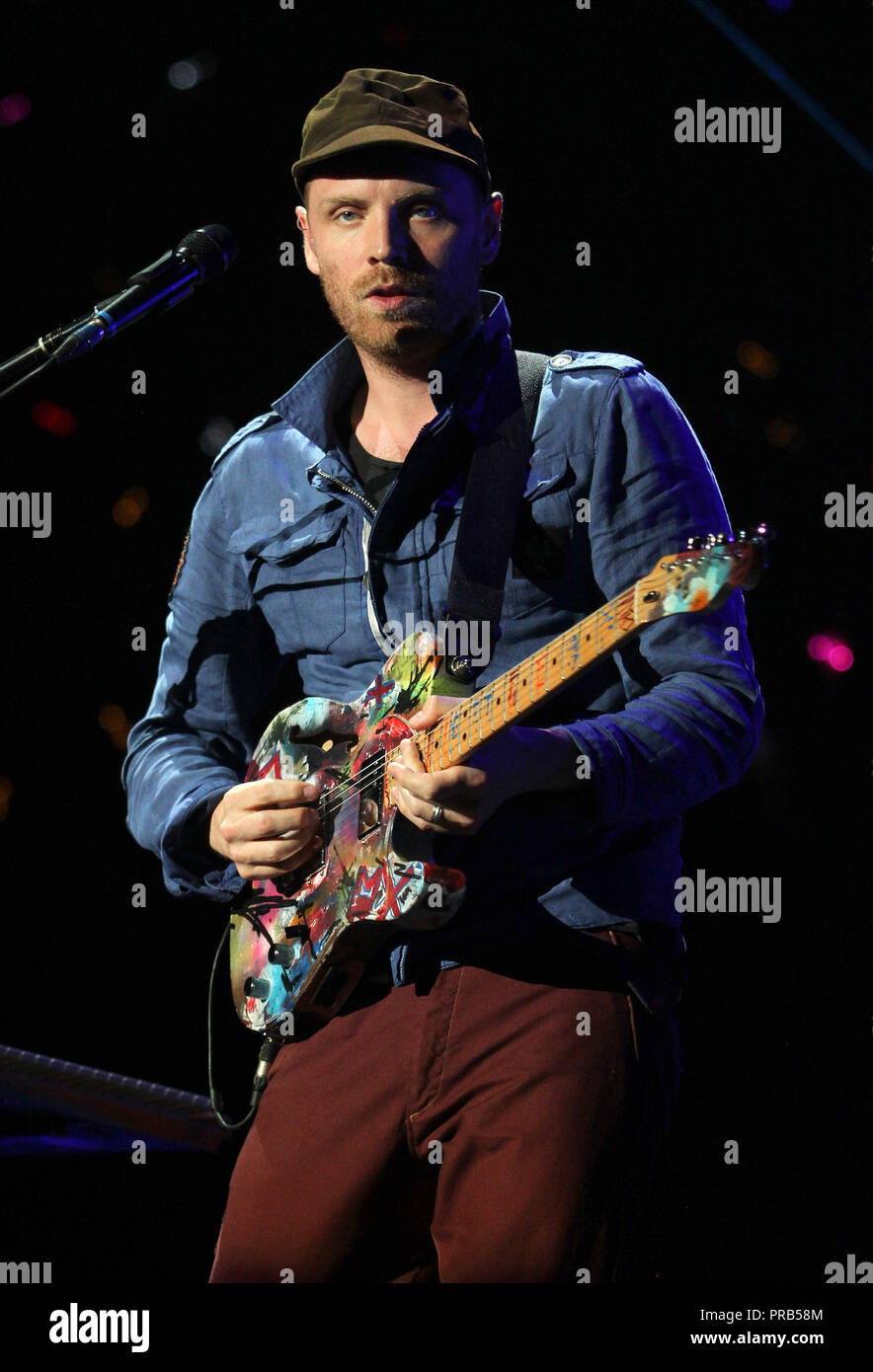 Jonny Buckland with Coldplay performs in concert on their Mylo Xyloto tour 2012 at the American Airlines Arena in Miami on June 29, 2012. Stock Photo