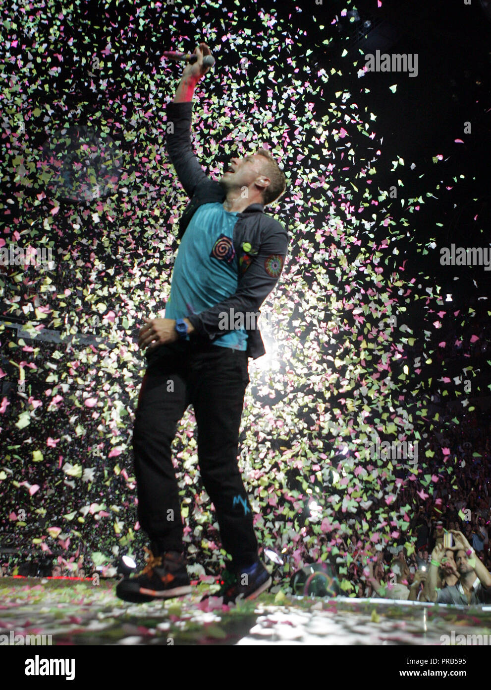 Chris Martin with Coldplay performs in concert on their Mylo Xyloto tour 2012 at the American Airlines Arena in Miami on June 29, 2012. Stock Photo