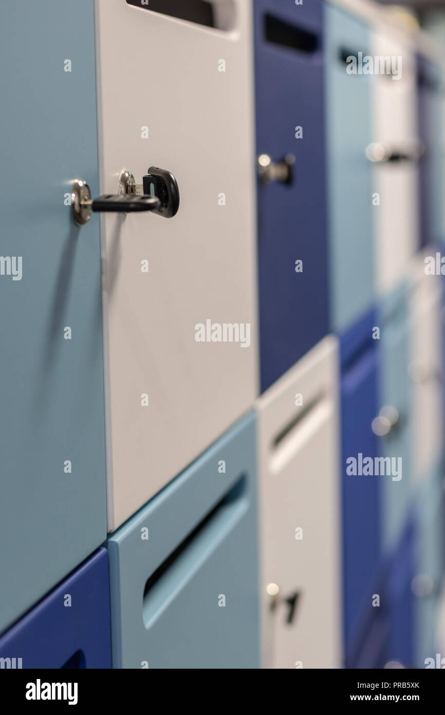 blue and white locker with keys , perspective Stock Photo Alamy