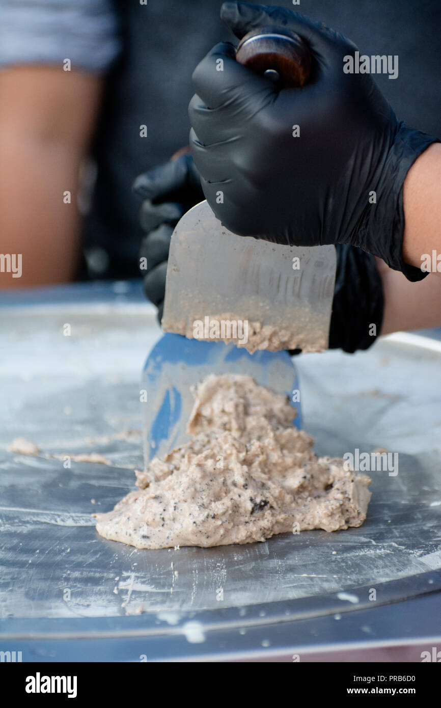 Rolled ice cream is a frozen dessert that originated in Southeast Asia
