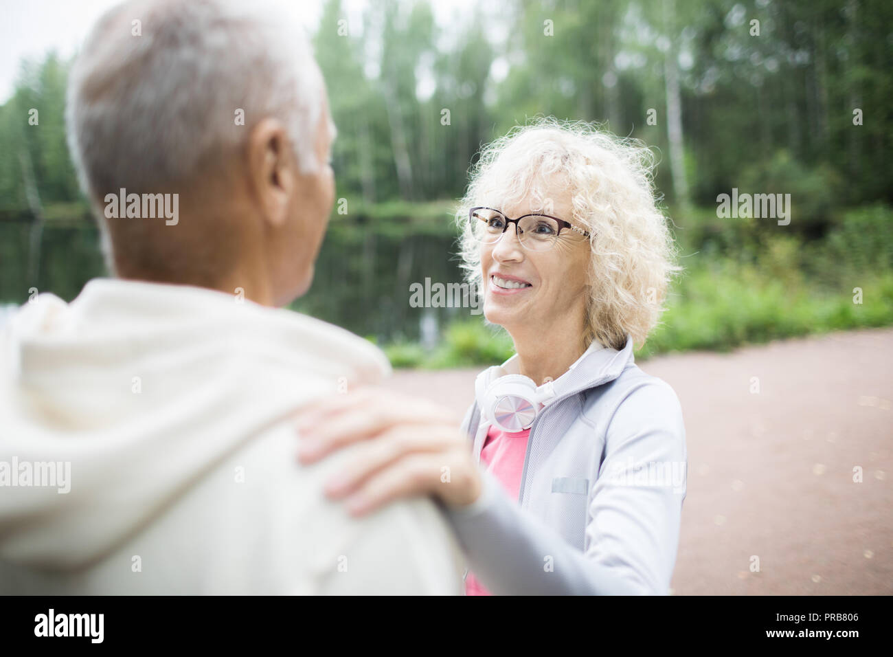 Husband looking after woman hi-res stock photography and images - Alamy